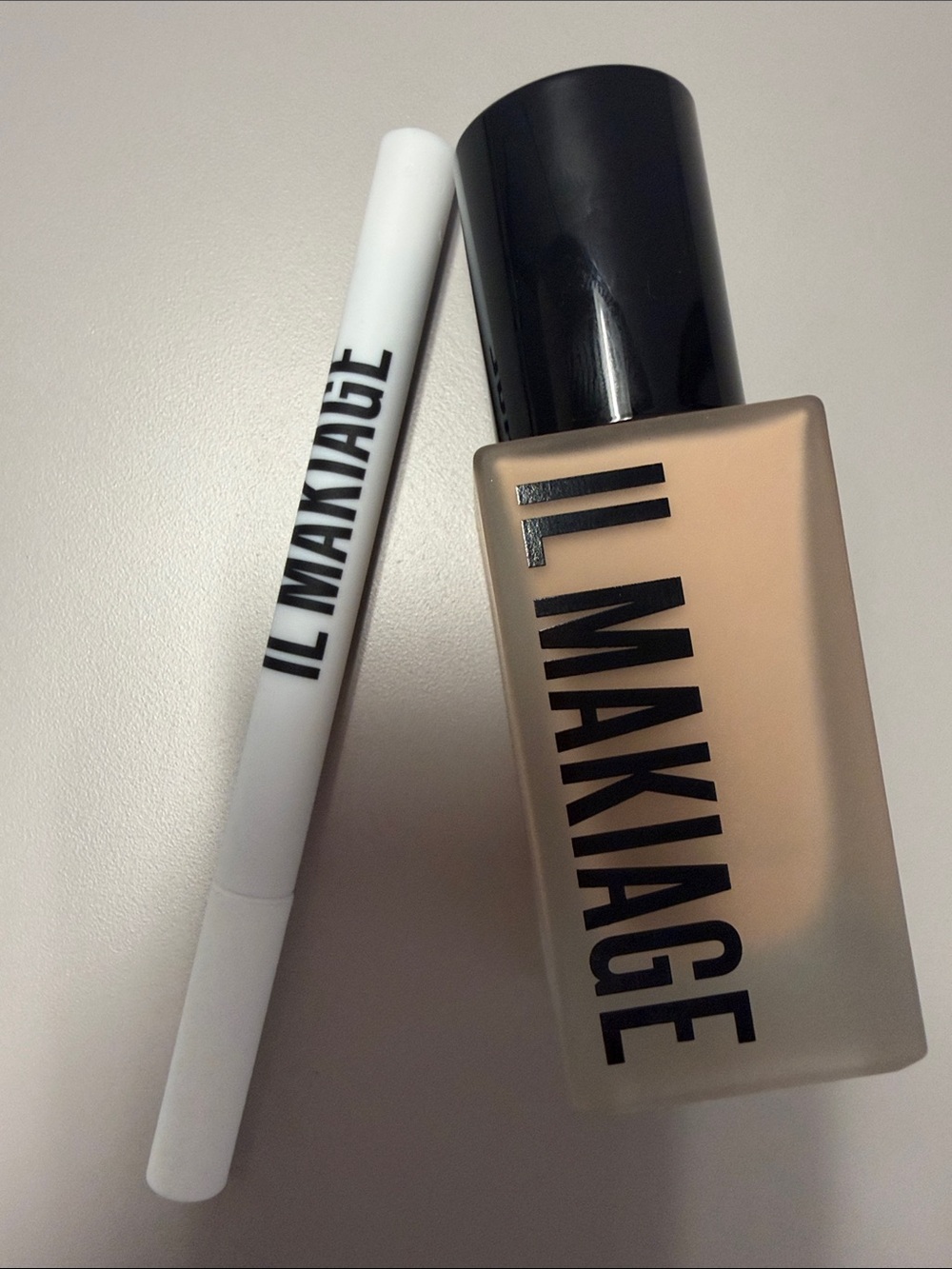 IL MAKIAGE Foundation in shade 35 with new black eyeliner